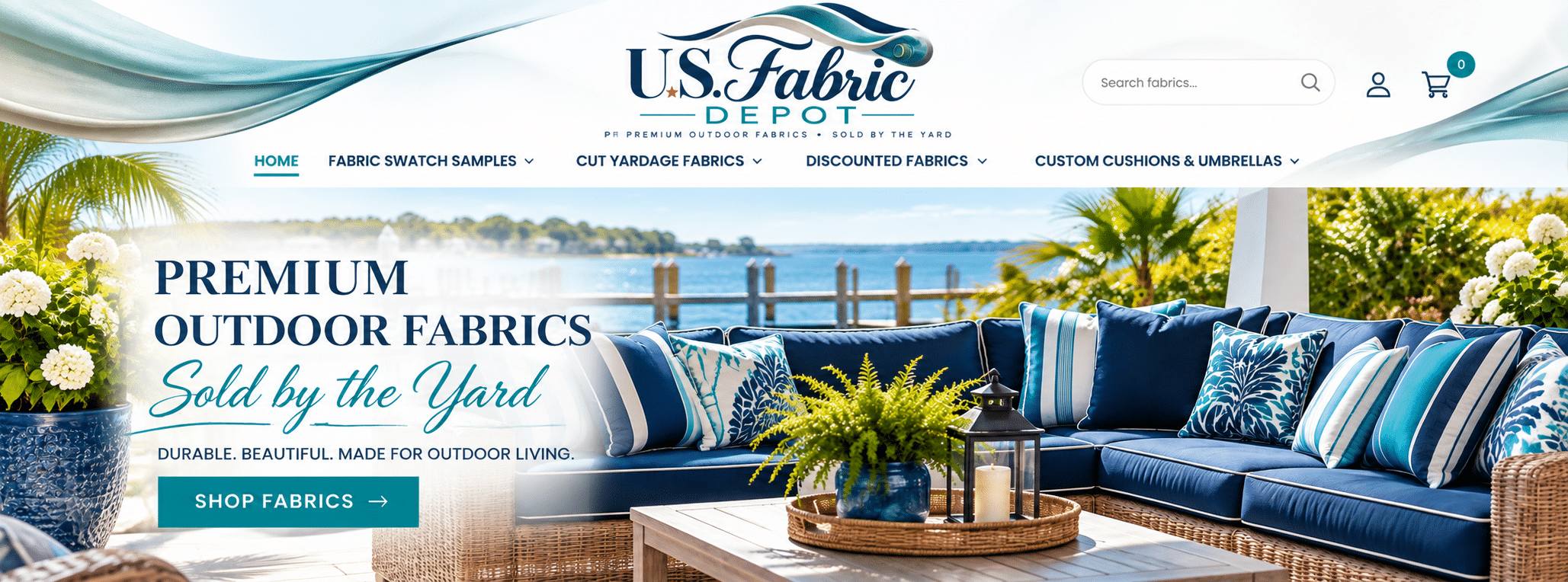 Outdoor navy cushioned seating and patterned pillows by the waterfront